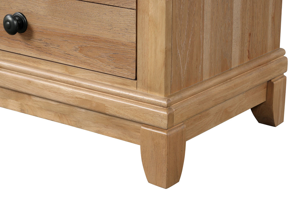 Farmhouse Oak Nightstand base detail. Sturdy wood legs and molded trim enhance farmhouse style and durability.