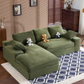 Green Corduroy Sofa with Cushions and Pillows.