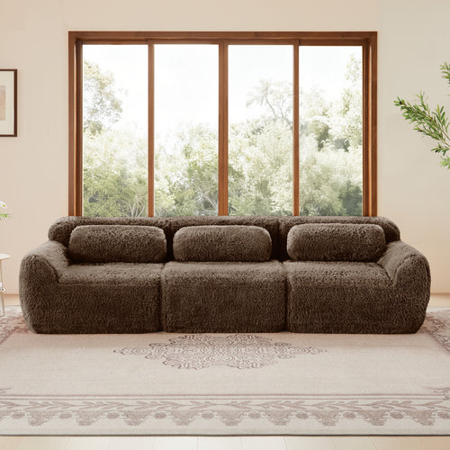 Front view of 114'' modular sofa - chocolate with plush upholstery and long back cushions, perfect for spacious interiors.