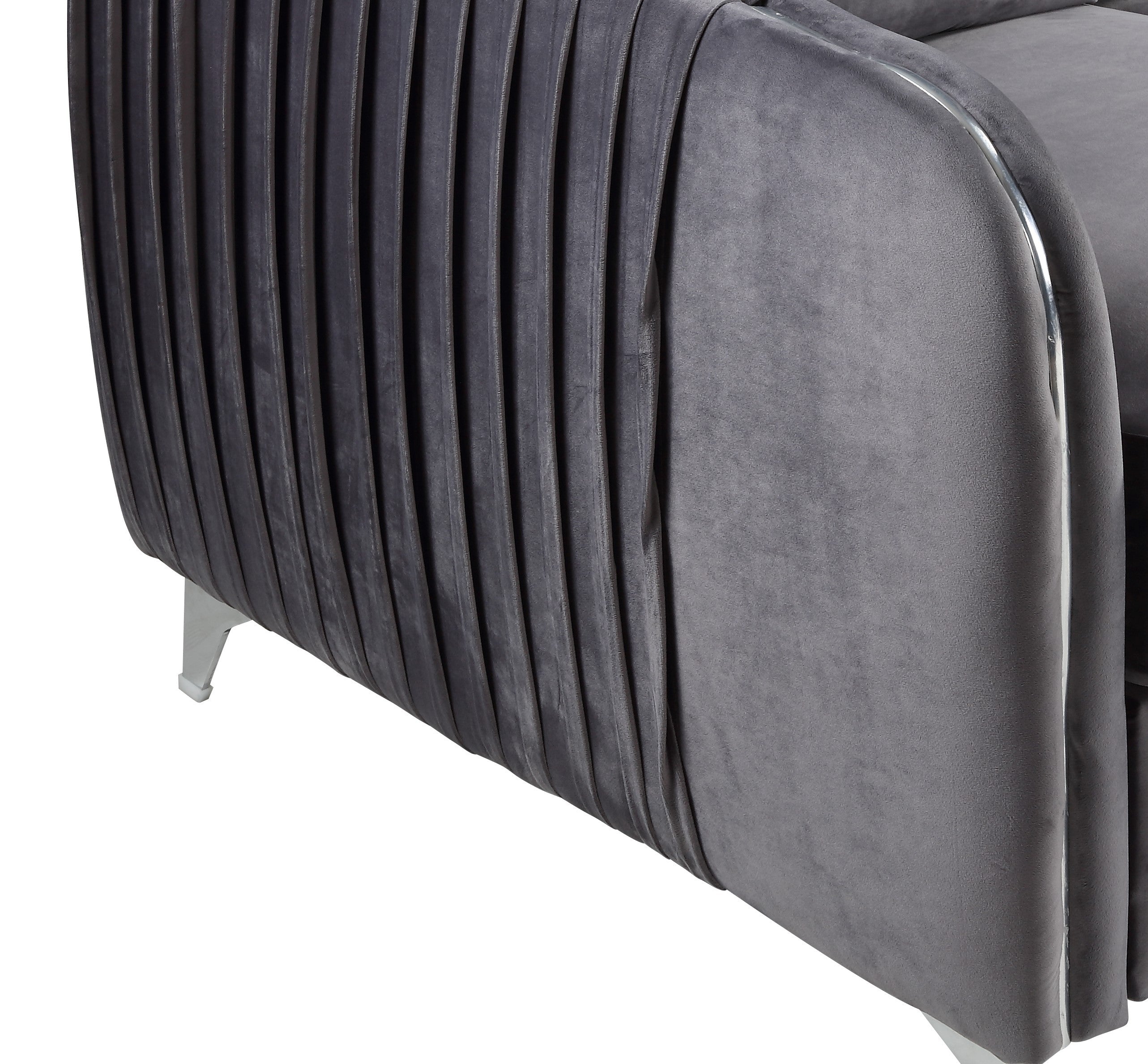 Detailed side view of the Hathaway 32' Gray Velvet Accent Armchair showing vertical channel tufting and smooth velvet texture.
