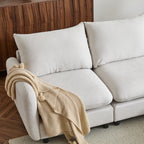 Close-up of 69 in. 2-Seats Modular Sectional Sofa Corner Chair Sofa Couch with beige knit throw, highlighting soft seat and back cushions.