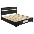 California king black wood storage bed with silver-toned glitter accents, built-in footboard drawers, and wood slats.