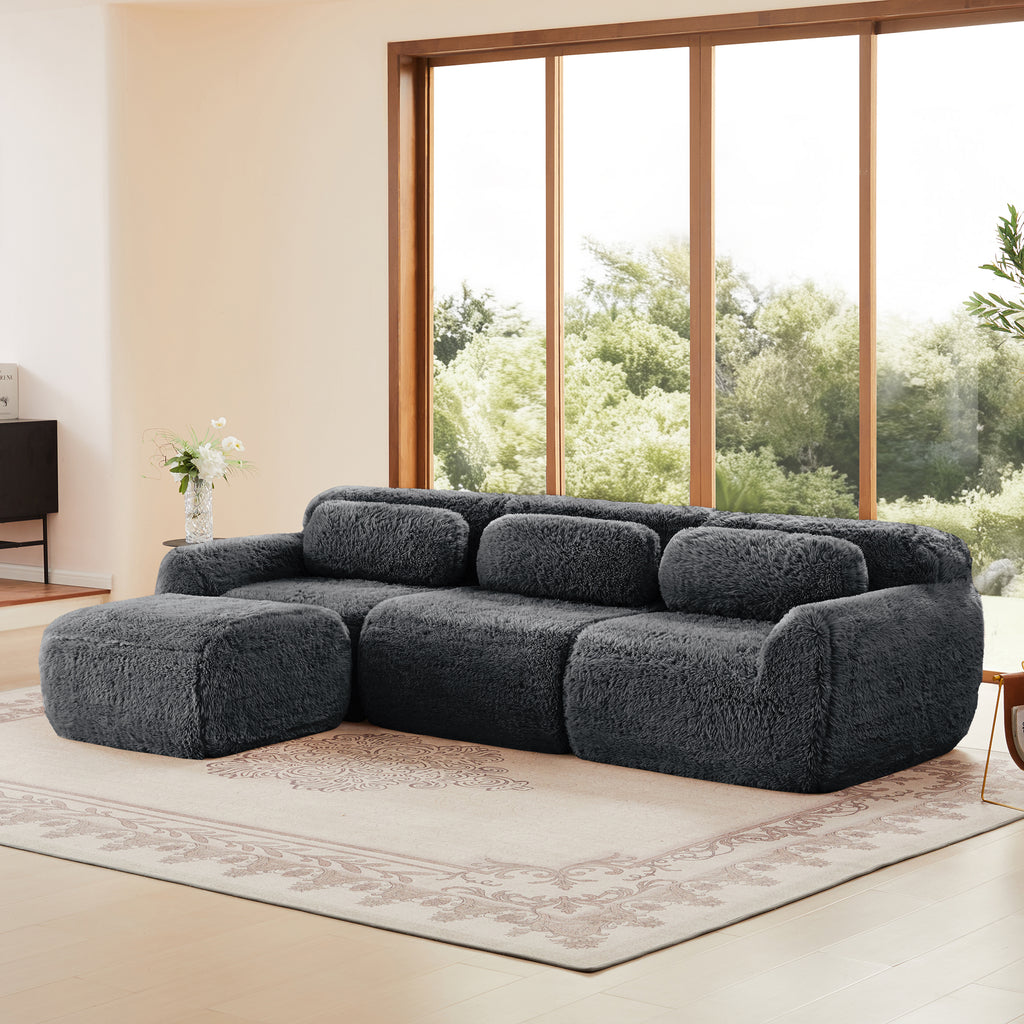Dark Grey Plush Sofa - L-Shaped, No Assembly | Modular Design displayed in a spacious room, emphasizing its soft texture and cozy configuration.