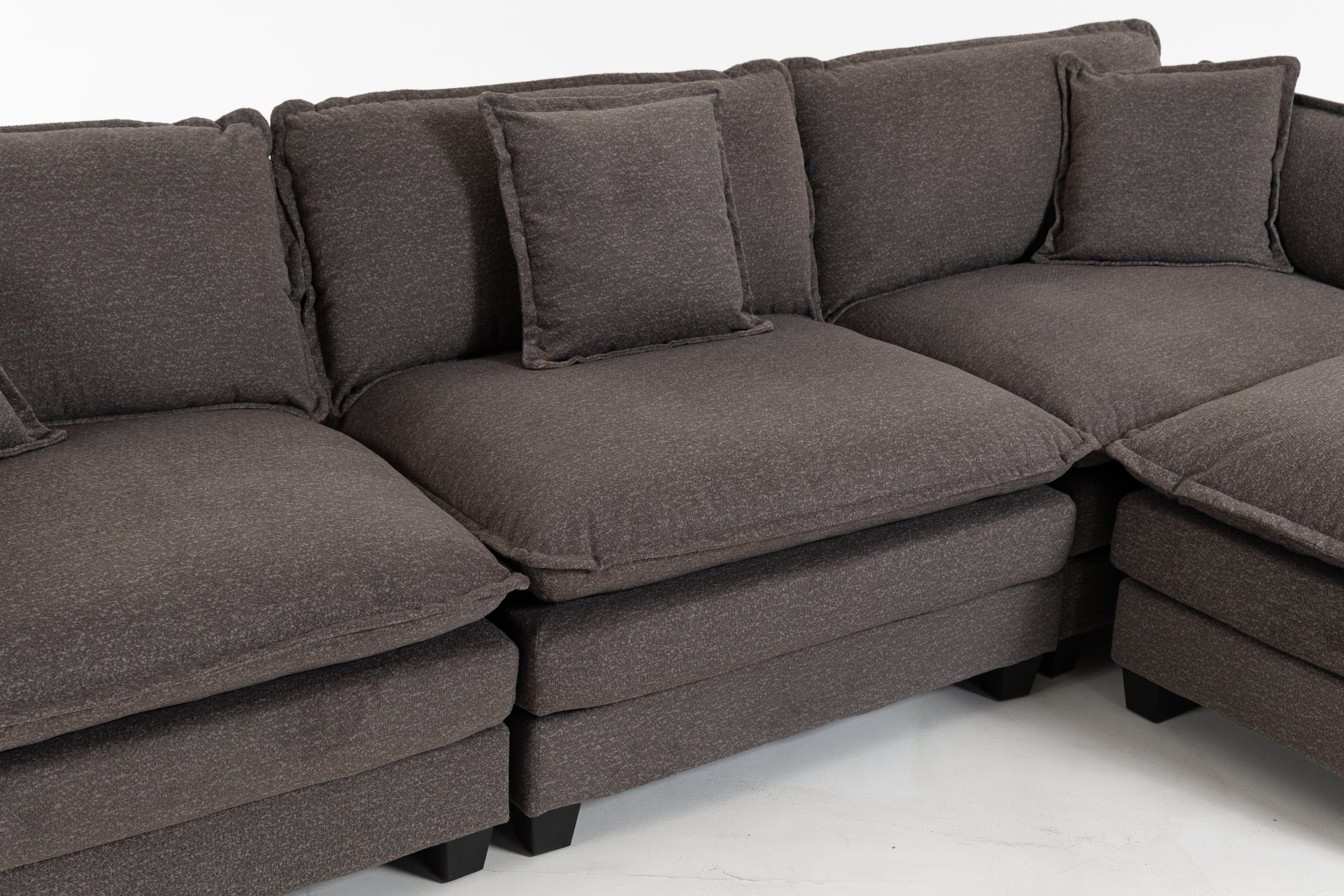 Detail view of Sectional Sofa cushions and waist pillows. High-quality sponge filling ensures long-lasting support and relaxation.