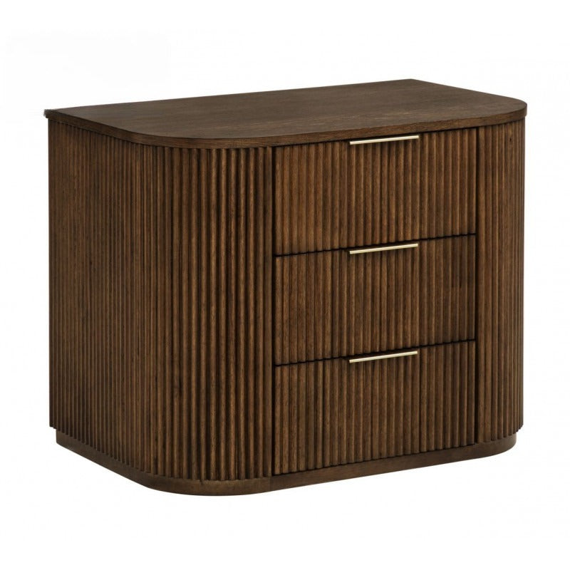Modern brown solid wood nightstand with a fluted texture, curved sides, and three drawers featuring slim gold handles.