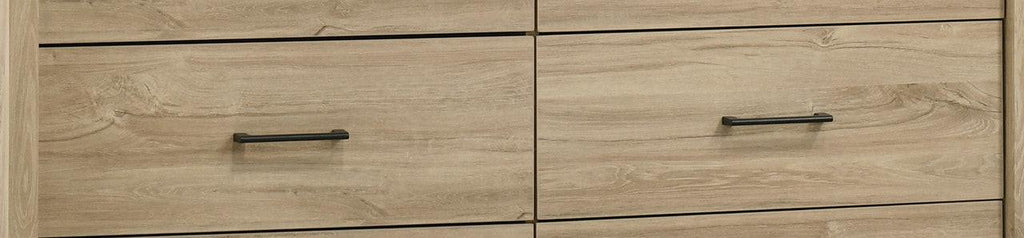 Light Oak 6-Drawer Dresser with Black Handles.