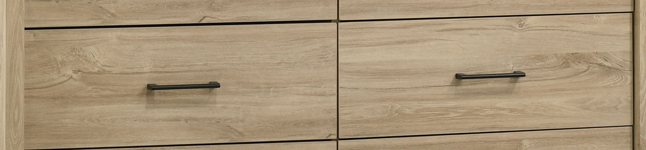 Front view of the Light Oak 6-Drawer Dresser - Celeste showing four drawers with black handles and natural wood texture.