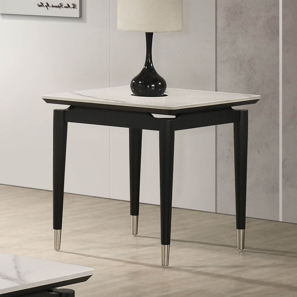 Modern Sintered Stone End Table with elegant arrow legs and silver accents, placed in a stylish interior setting.
