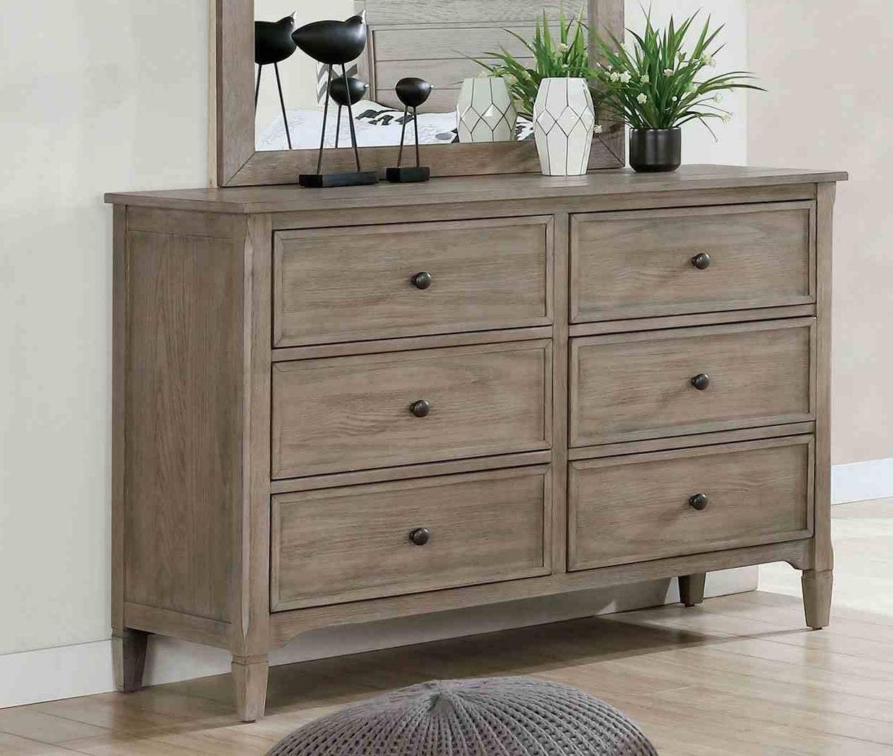 Transitional Gray Dresser with Round Pull Knobs.