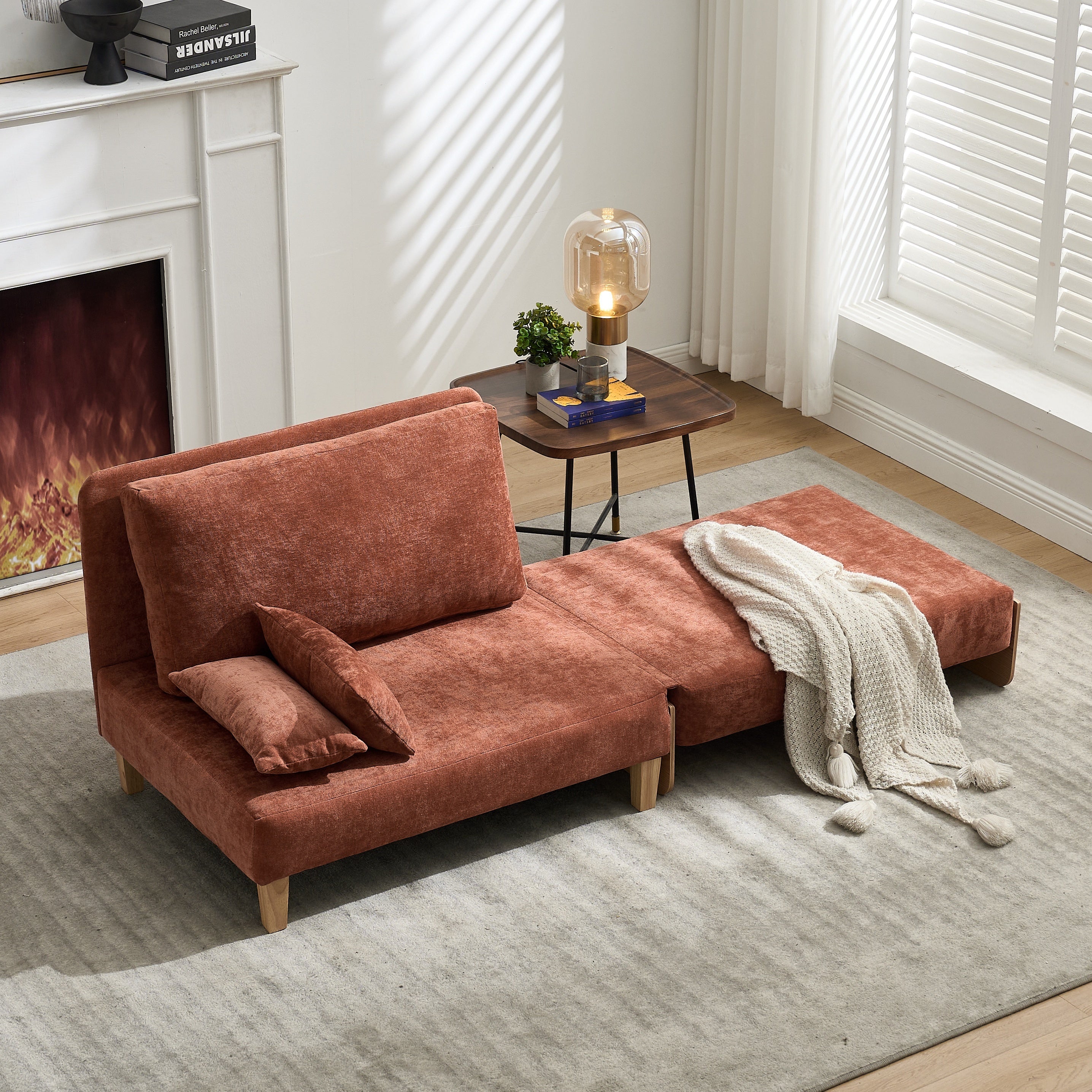 Convertible Sofa Bed Recliner - 3-in-1 in bed mode with blanket and pillows, showcasing its cozy and functional design for small homes.