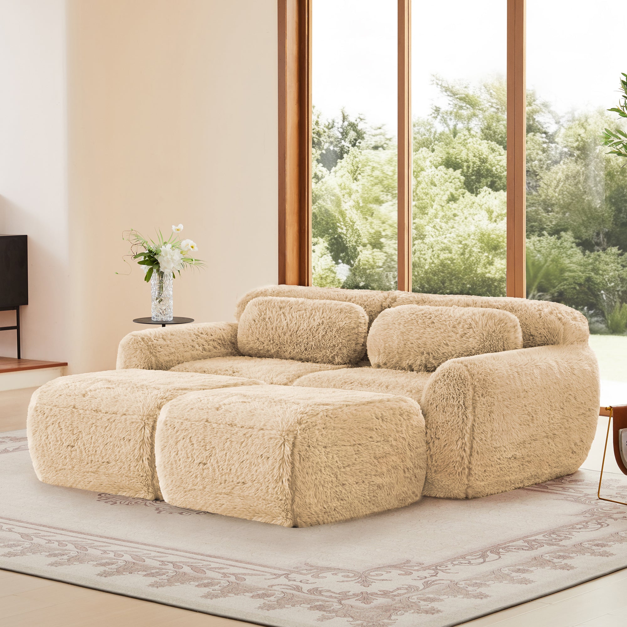Side angle of modular sectional sofa in plush fabric, showcasing no-leg design and ergonomic backrest for comfort.