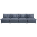 Blue corduroy modular sofa with four seats and removable pillows, ideal for modern living room setups. Features plush cushions and sleek design.