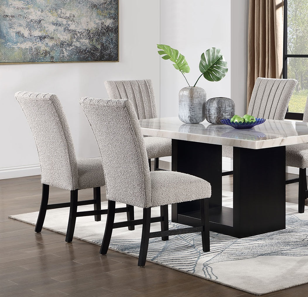 Close-up of Genuine Marble Dining Table Set showing boucle fabric chairs and polished marble top with wood base.