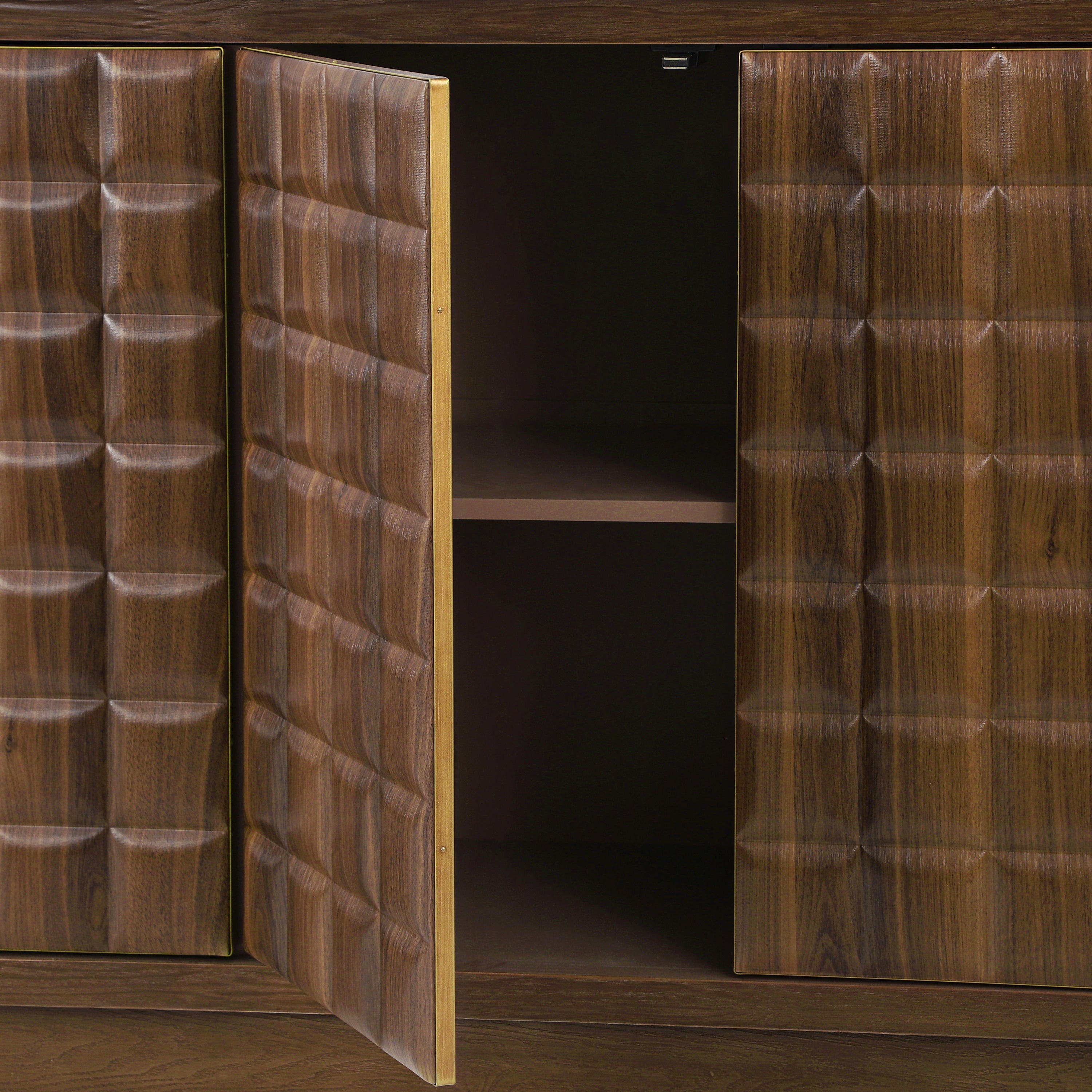 Close-up of open geometric doors on 4-door storage cabinet, highlighting textured wood pattern and metal trim accents.