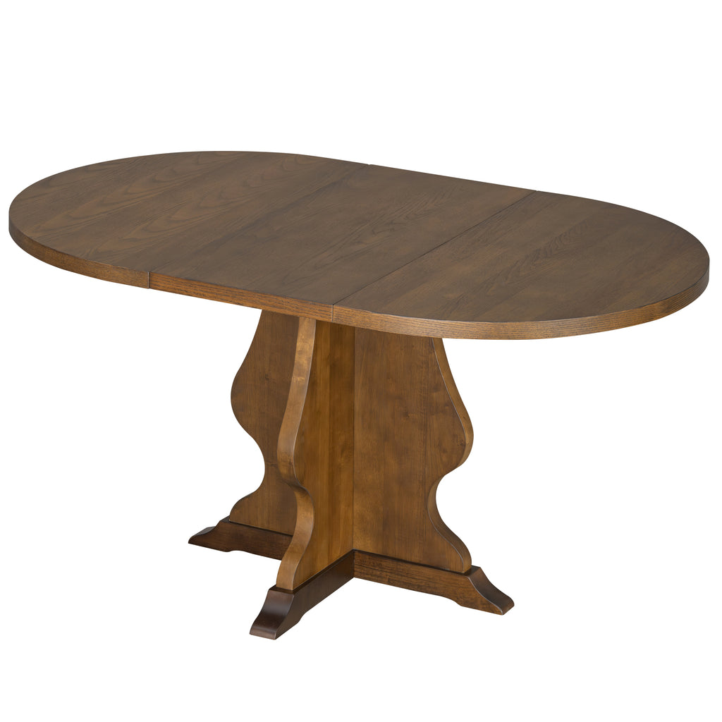 Farmhouse-style extendable dining table in oval shape with sculpted pedestal base, ideal for trendy and practical home dining.