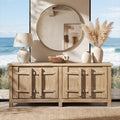 Natural light brown reclaimed pine sideboard with four doors featuring rustic crossbar details in a coastal setting.