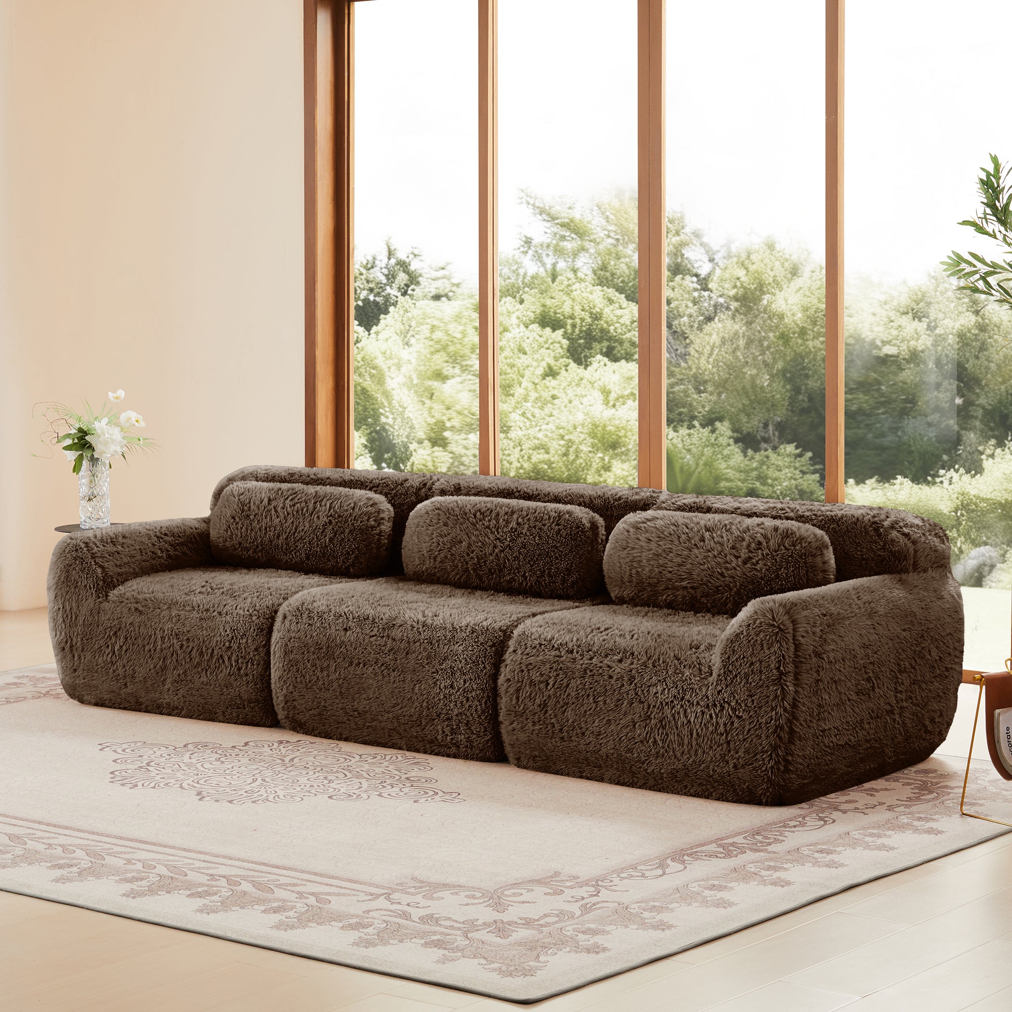 Side angle of 114'' modular sofa - chocolate showcasing soft plush texture and deep seating for enhanced comfort.