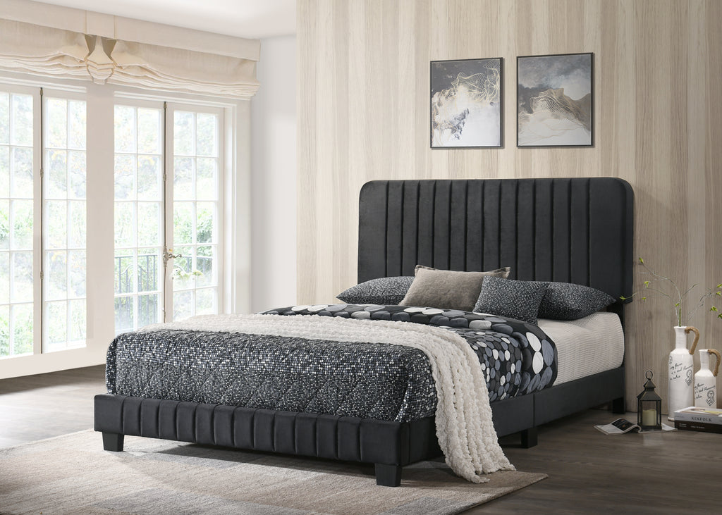 Sleek, contemporary black velvet full bed frame featuring a tall, vertical channel-tufted headboard and matching base.