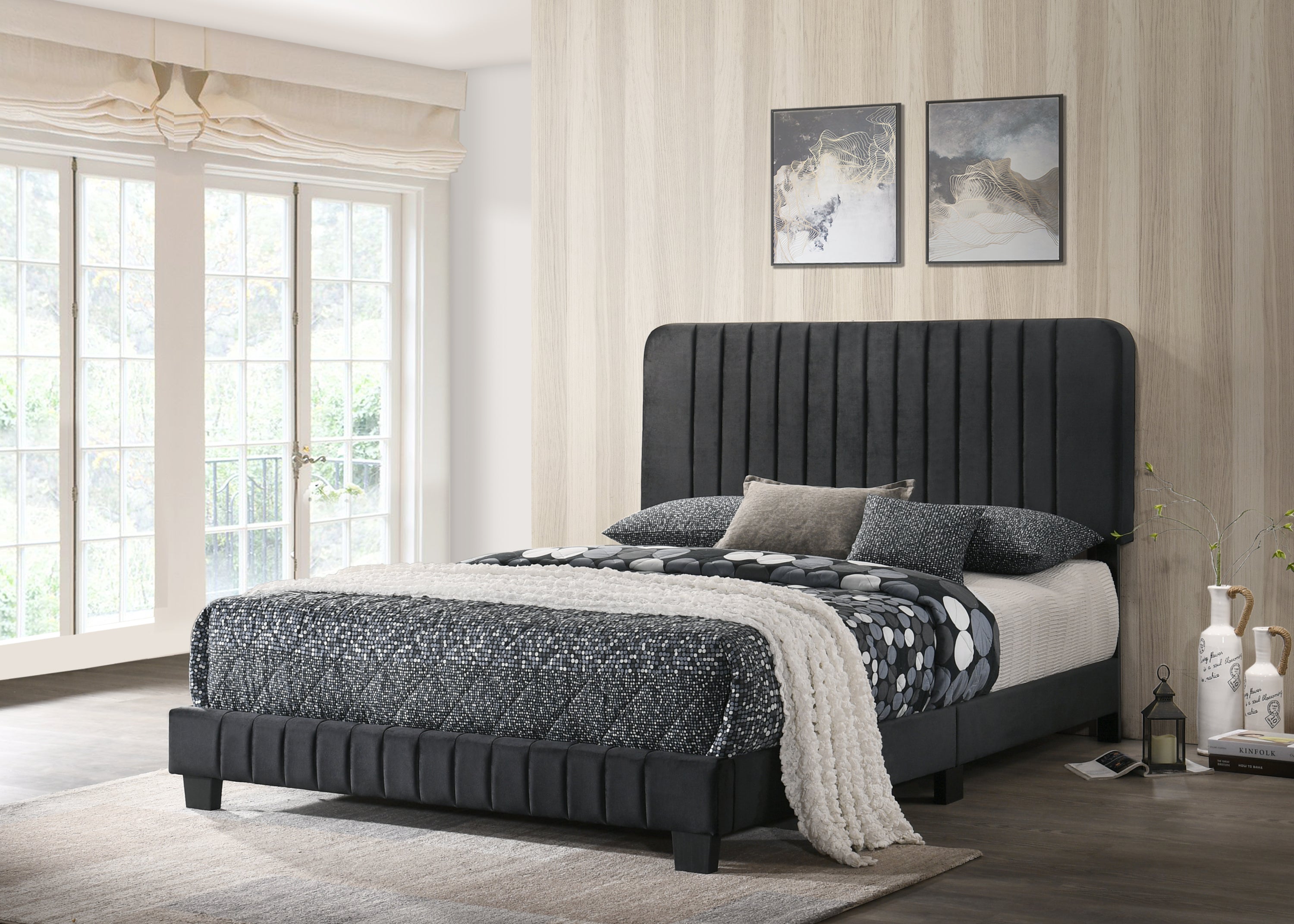 Sleek, contemporary black velvet full bed frame featuring a tall, vertical channel-tufted headboard and matching base.
