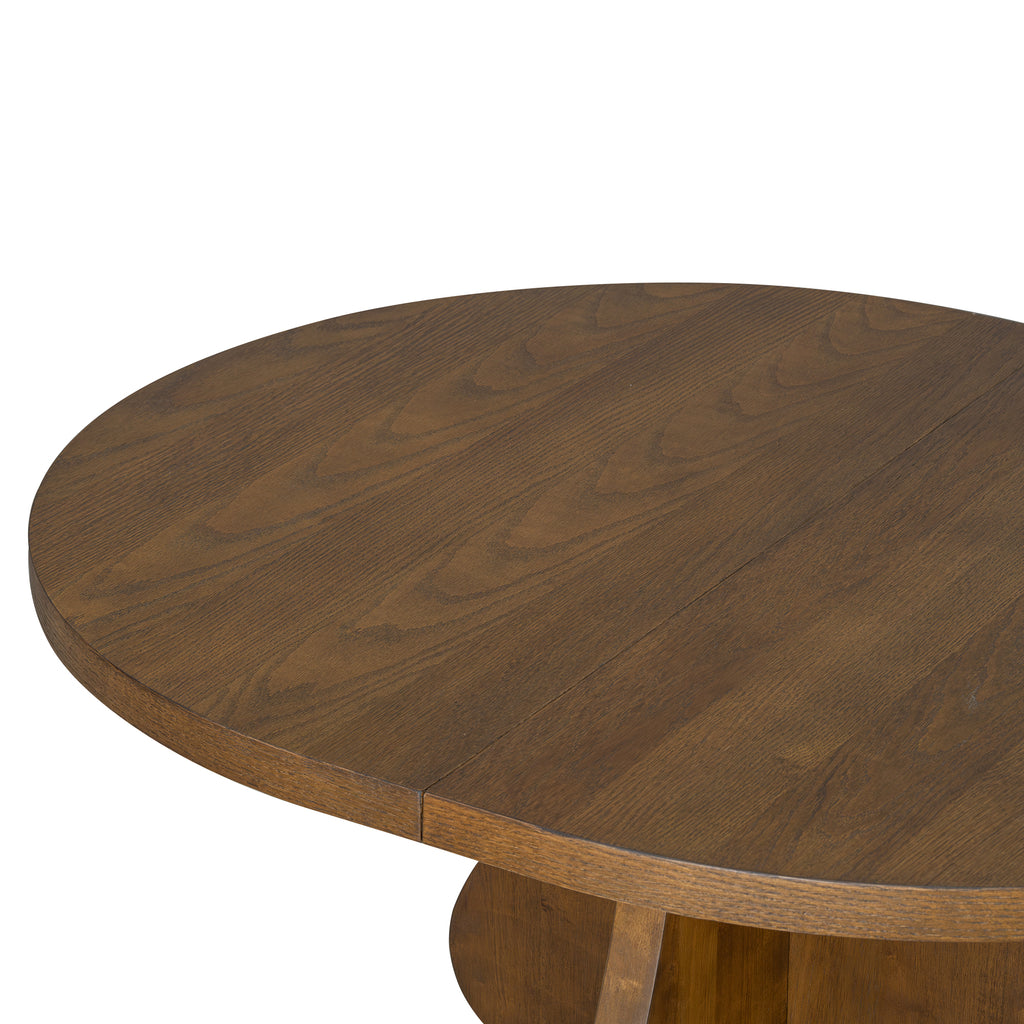 Close-up of round wooden tabletop with visible grain pattern. Part of the extendable farmhouse dining table set.