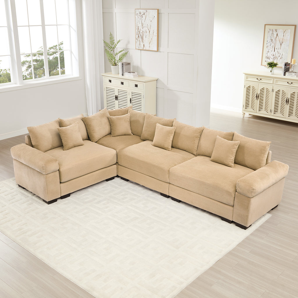 Oversized camel corduroy modular sectional sofa with deep seating, wide armrests, and multiple matching throw pillows.