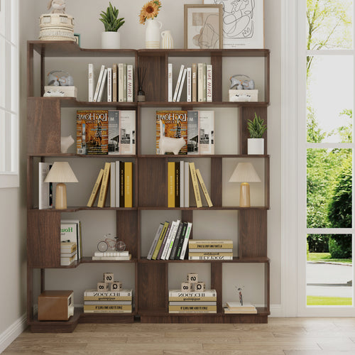 Dark brown wooden L-shaped and I-shaped modular bookcase set with open shelves styled with books, lamps, and decor.