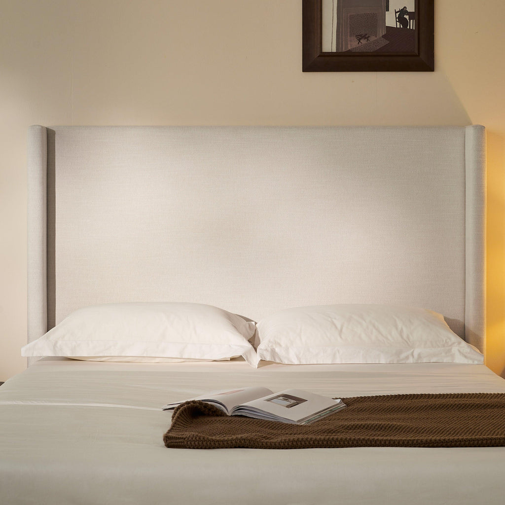Hosford Minimalist Upholstered Wingback Bed.