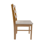 Side profile of a solid wood dining chair with padded seat, included in the Solid Wood Dining Table Set - 4 Chairs.