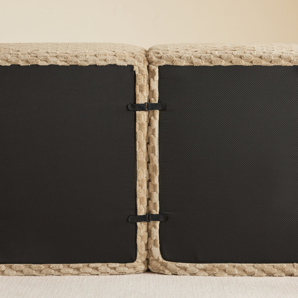 Close-up of the anti-slip connectors on the bottom of the Modern L-Shaped Modular Sofa - Oversize 4-Seater Couch in light camel fabric.