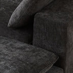 Close-up of cushion and armrest on Chenille Cloud Sofa. Soft chenille fabric and thick padding for enhanced comfort and durability.