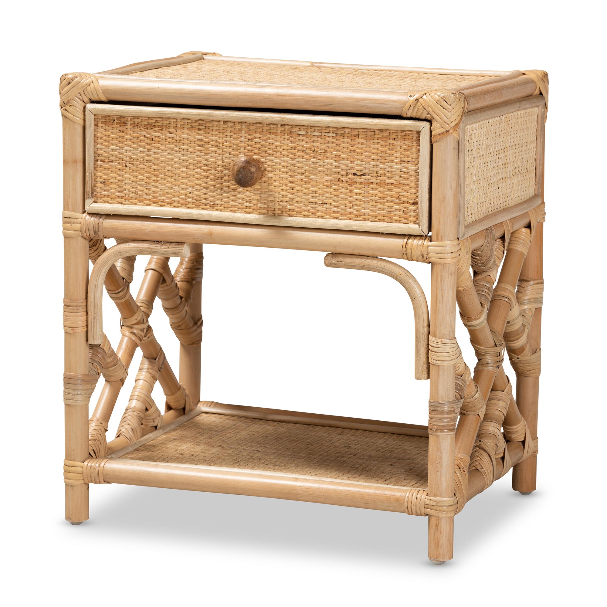 Boho natural rattan nightstand with a woven drawer, single wooden knob, open shelf, and decorative cross-frame sides.