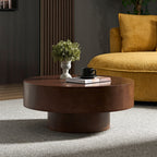Modern Faux Burl Coffee Table with pedestal base placed in a stylish living room, highlighting its rich wood grain texture.