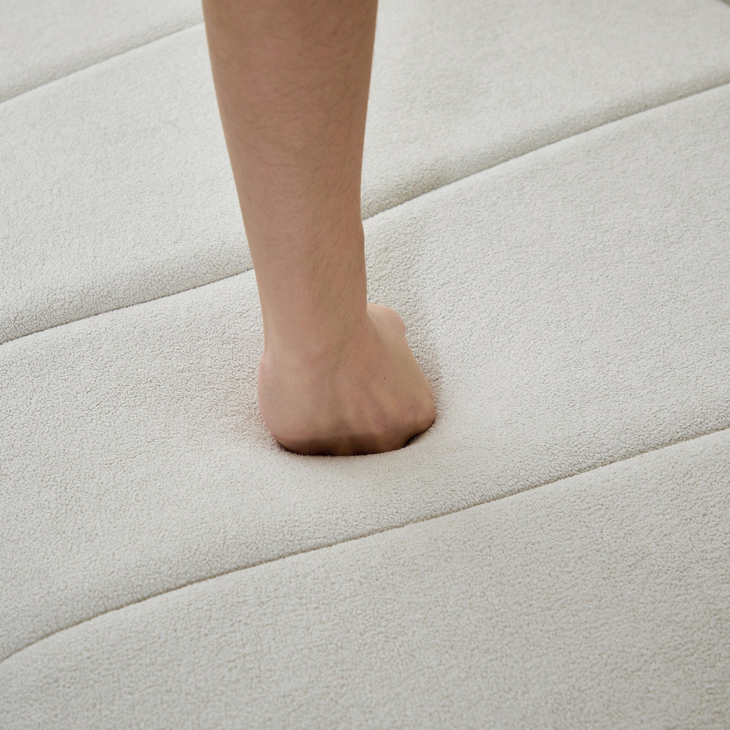 Curved Sectional Sofa with 4 Pillows for Stylish Seating.