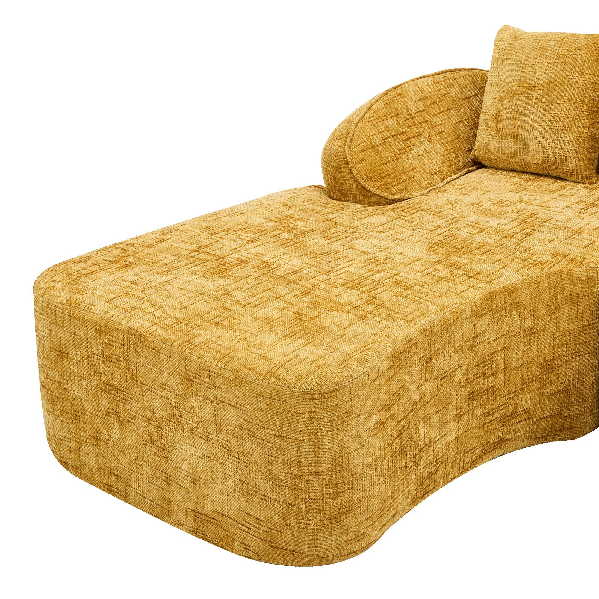 Close-up of chaise section on yellow chenille L-shaped sofa, featuring soft curves and textured upholstery for relaxed seating.