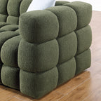 Side view of Olive Green Boucle Sofa - 3 Seater, Marshmallow Cozy showing rounded, tufted armrest and boucle texture.