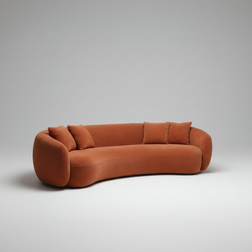Orange sofa in a modern living room with decor elements.