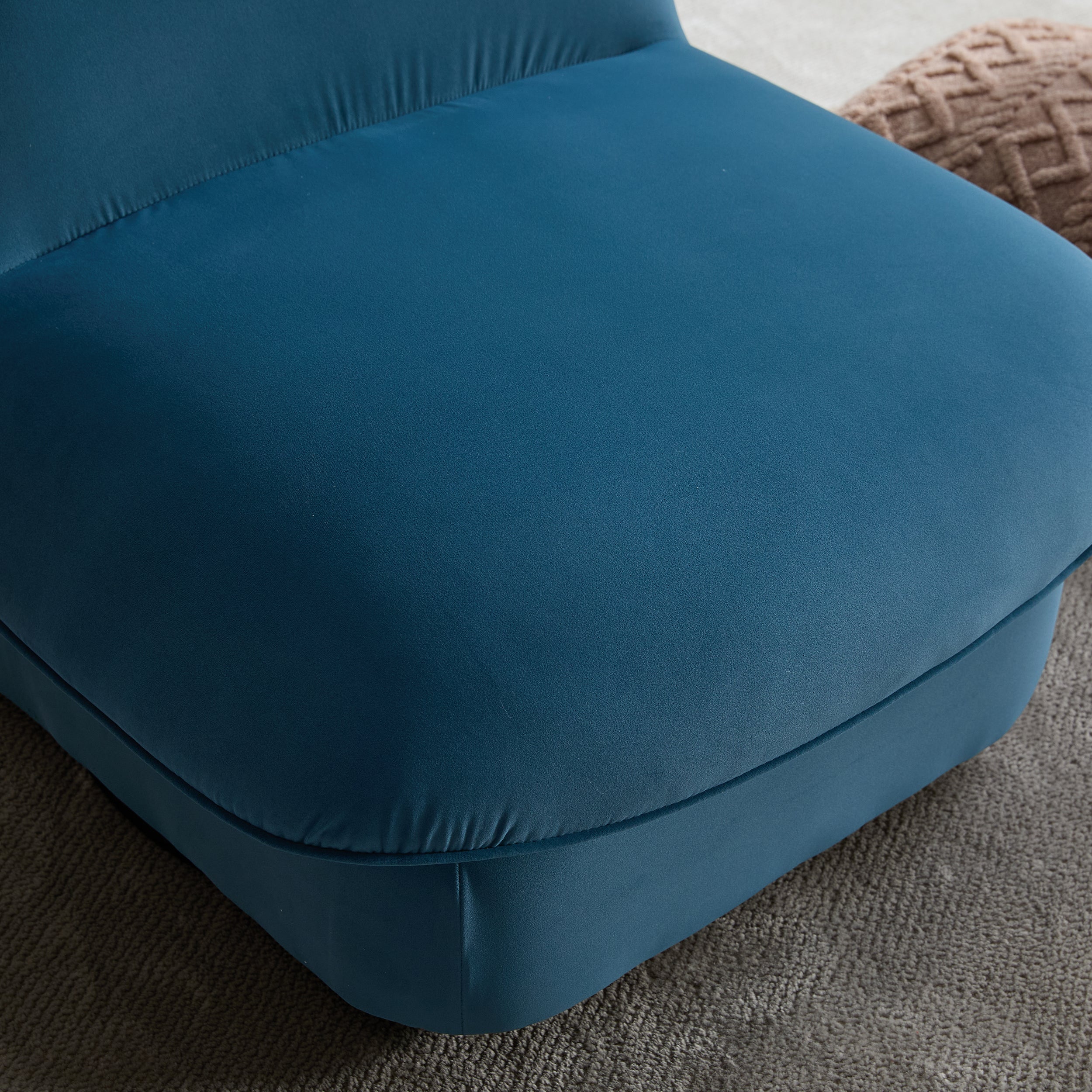 Close-up of the seat cushion on the velvet swivel accent chair, highlighting the soft and thick padding for enhanced comfort.
