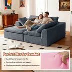 Couple relaxing on modern L-shaped sectional sofa with chaise, emphasizing comfort, resilience, and moisture resistance.