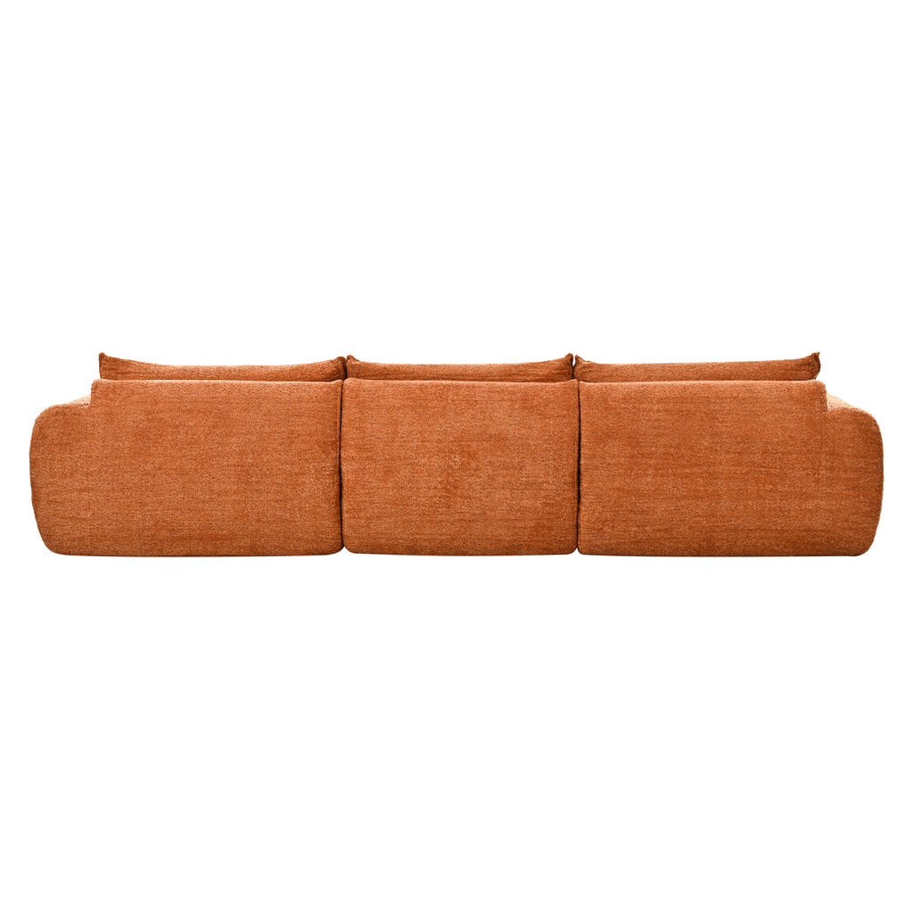 Back view of 116'' compressed sofa no assembly in burnt orange, designed with high density foam and a seamless, modern silhouette.