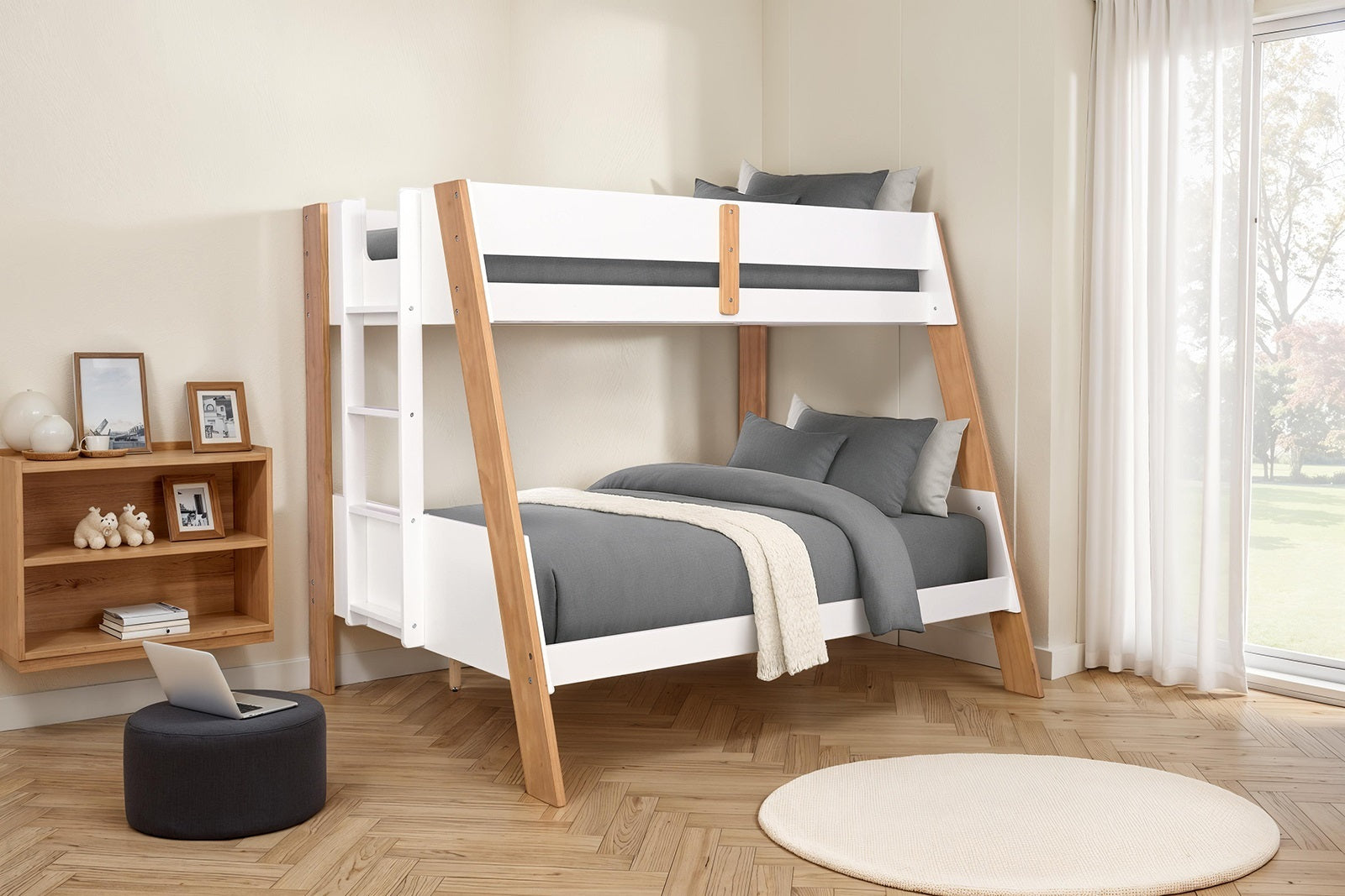 Twin over full bunk bed with ladder and natural finish in a modern bedroom, featuring gray bedding and wood flooring.