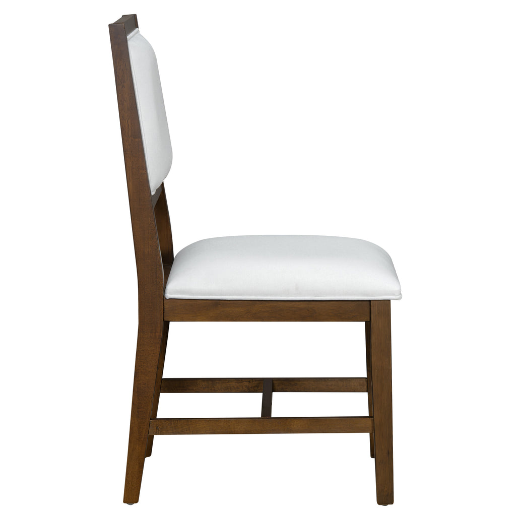 Upholstered dining chair with cushioned seat and backrest in white fabric, part of the Farmhouse Dining Table Set - Trendy & Practical.