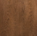 Detailed texture of the bourbon-finished oak surface on the Haven 49 Inch Coffee Table, emphasizing natural wood grain pattern.