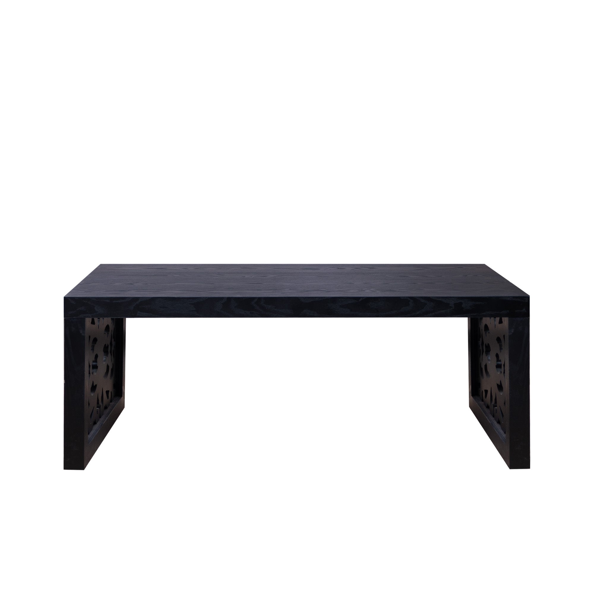 Front view of 47.2' solid black carved wood coffee table highlighting its sleek top and symmetrical carved side panels.