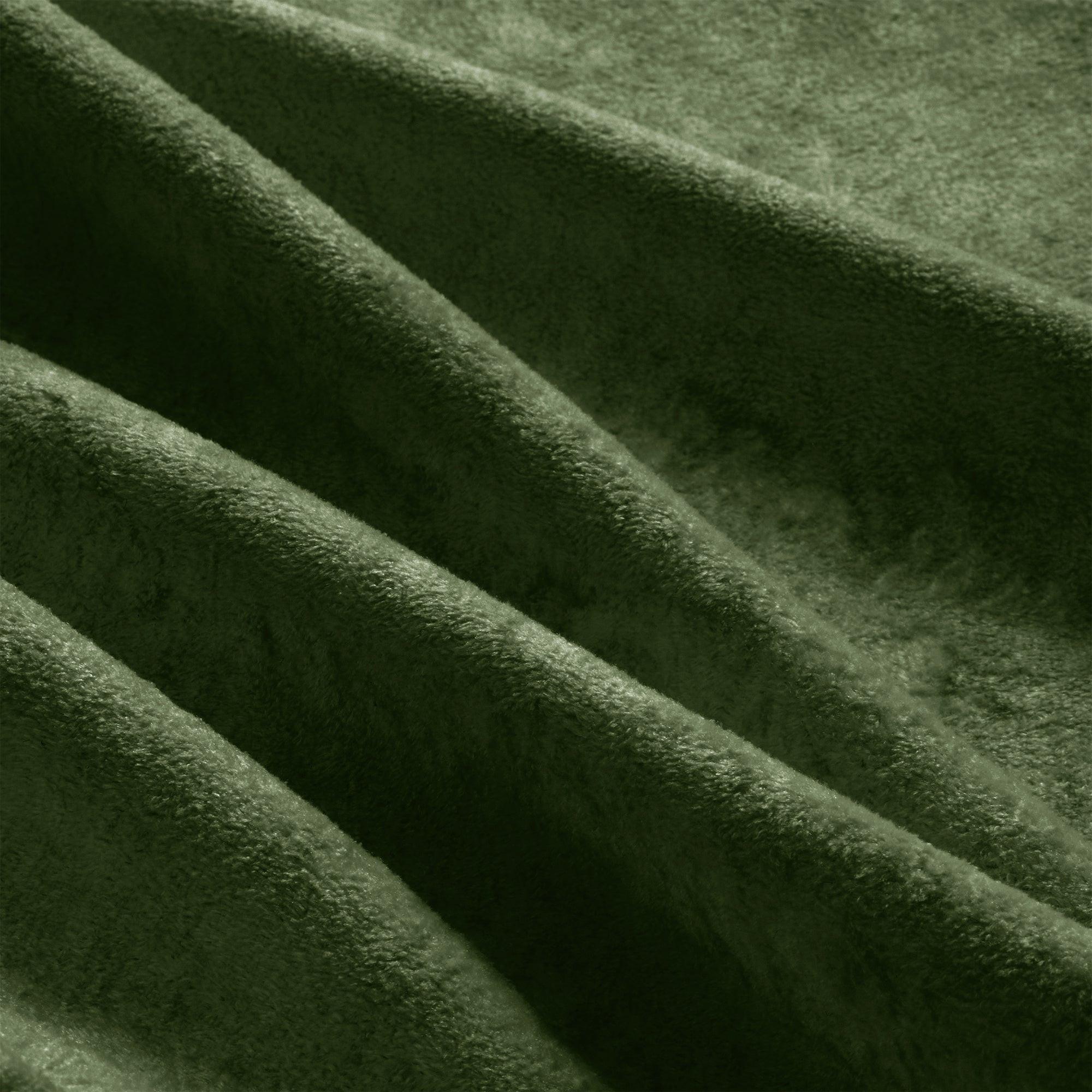 Modular Velvet Sofa in Green with Tassel Skirt.