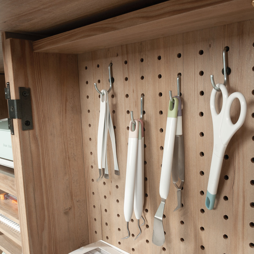Pegboard inside Craft Cart with Storage for Home holding crafting tools, perfect for organized and accessible storage.