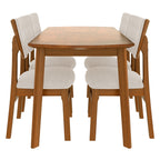 Front view of farmhouse dining table set with 4 chairs neatly tucked under the table, highlighting its compact and space-saving design.