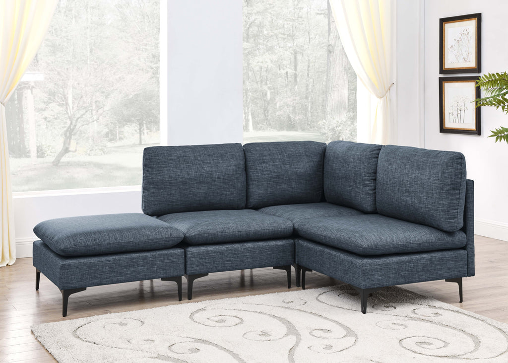 Modern modular sectional in dark blue linen-look upholstery featuring plush cushions and sleek black metal legs.