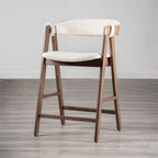 Mid-Century Modern 2pc Counter Stool with walnut wood frame and beige seat, shown on wood flooring for home decor inspiration.