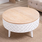 Closed round coffee table with white carved base and natural wood top, ideal for boho and farmhouse living room settings.