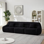 Full-length 4-seater Modern Black Modular Sofa in chenille, styled against a white wall with modern decor and soft area rug.